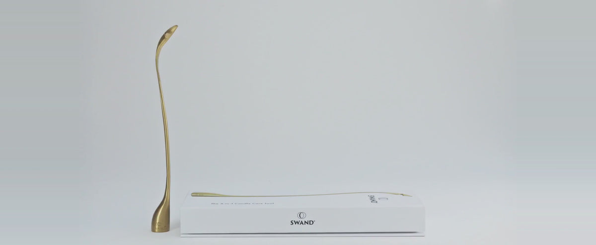 The SWAND Queen lifted from its plastic-free magnetic box and set standing beside it.
